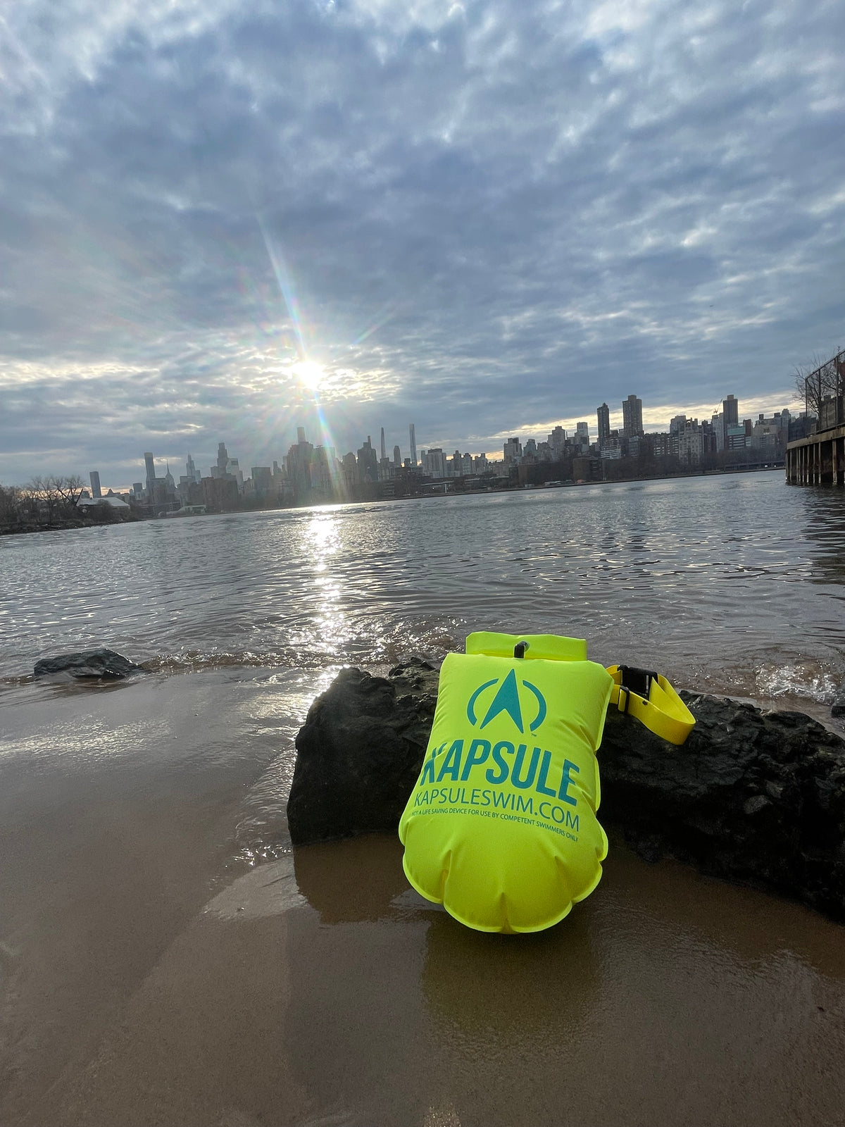 KAPSULE Aegis 20L swim buoy lightweight polyether TPU safety float on sandy beach open water
